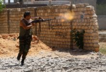 A fighter loyal to the UN-recognized Libyan Government of National Accord (GNA) clashes with forces loyal to strongman Khalifa Haftar in the suburb of Ain Zara in Tripoli on September 7, 2019.