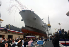 Military Sealift Command's newest ship, fleet replenishment oiler USNS Harvey Milk (T-AO 206), slides into the water during the christening ceremony at General Dynamic NASSCO, San Diego. The ship honors Navy veteran and LGBT activist Harvey Milk, one of the first openly gay candidates elected to public office as a member of the San Francisco Board of Supervisors in 1978.