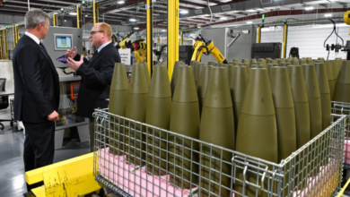The newly opened Load, Assemble, and Pack (LAP) facility in Camden, Arkansas. A group of 155mm ammunition can be seen in the foreground, neatly placed in a raised platform.